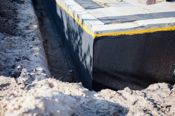 Professional Waterproofing technician working in Continental, OH